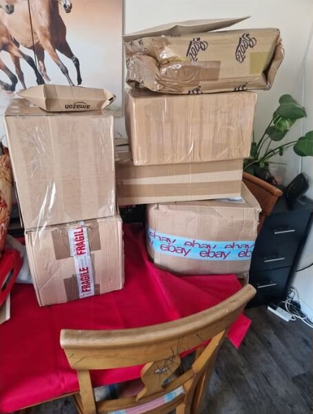 A stack of eBay and Amazon parcels won from House of Cornwall